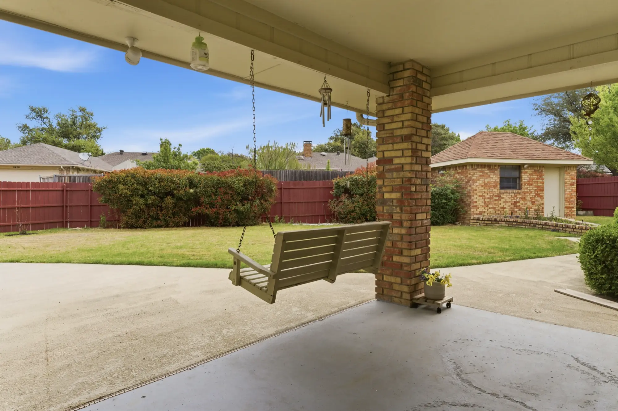 Covered patio with porch swing